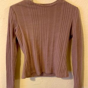 A pink sweater